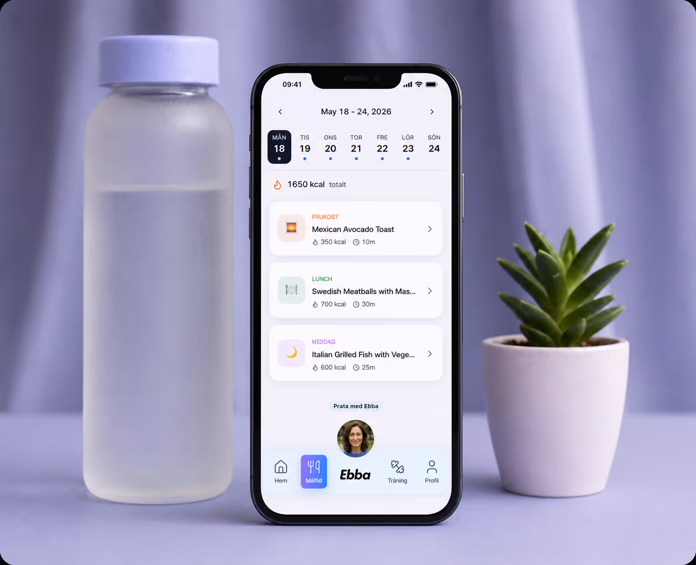 The Ebba app showing the week's meal plan with calories and recipes on an iPhone